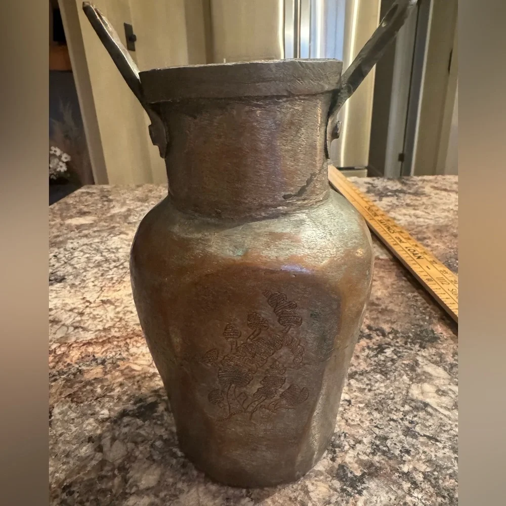 vintage collectible is a hand-hammered Turkish copper vessel